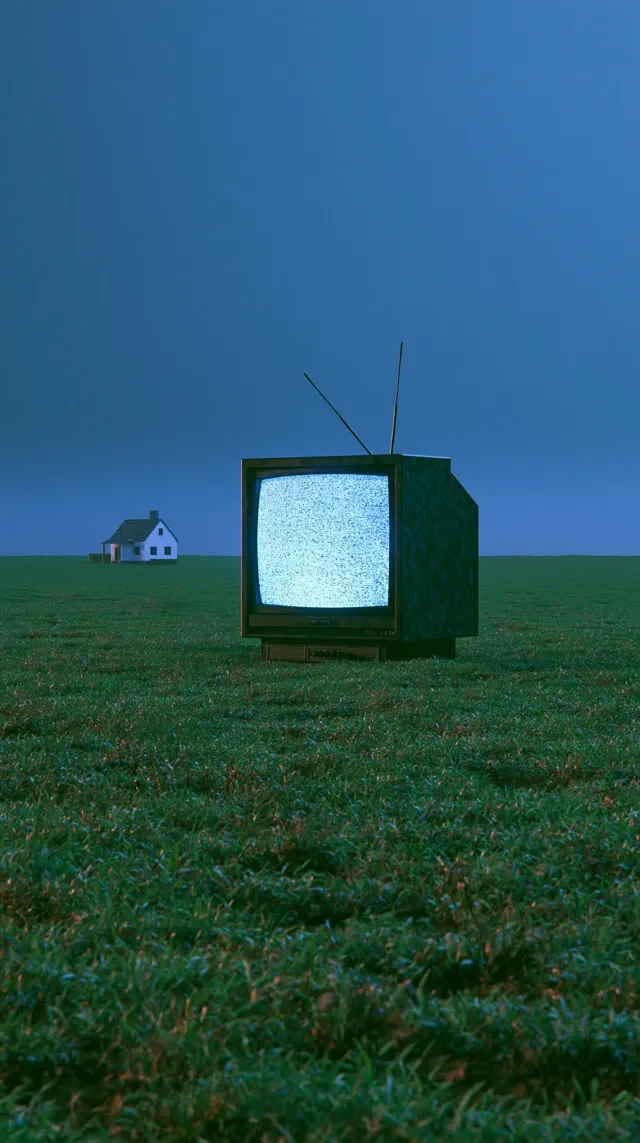 PS1 dreamcore, enormous old CRT television standing alone in a perfectly flat green field, screen glowing with static, tiny low-poly house in the distance, deep blue sky, pixelated textures, primitive polygonal geometry, dithering, vertex wobble, warped perspective, subtle fog, strange nostalgic childhood atmosphere, uncanny late-90s PlayStation game aesthetic, ultra-wide cinematic 4:1 composition